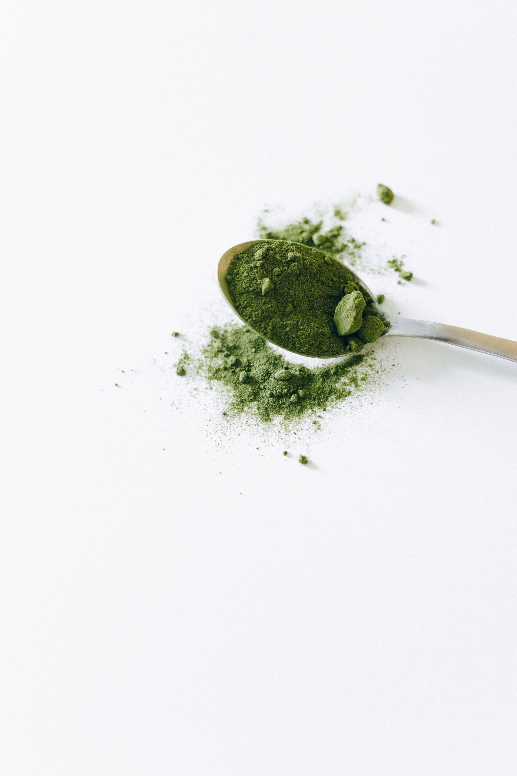 green powder on spoon